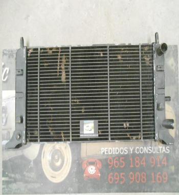 RAM87P4 RADIADOR MOTOR FORD ESCORT MKIV ORION II 1.1/1.3 COBRE MEDIDA 600x305x38mm MONTAÑA