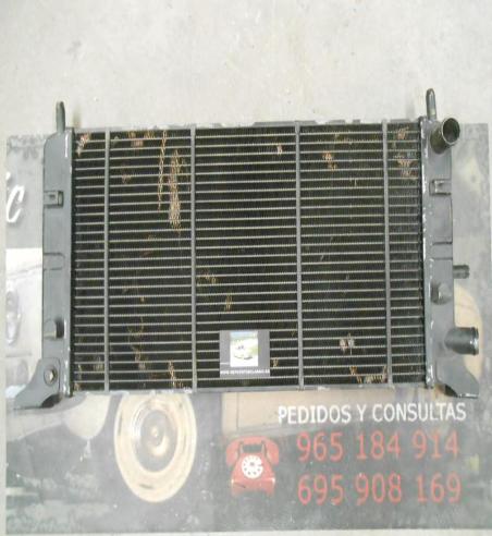 RAM87P4 RADIADOR MOTOR FORD ESCORT MKIV ORION II 1.1/1.3 COBRE MEDIDA 600x305x38mm MONTAÑA