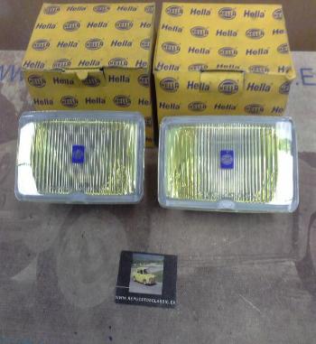 H166P2 JUEGO OPTICAS FAROS ANTINIEBLAS H3 AMARILLOS COMET 550 195x95mm. HELLA 1ND135243011-14188