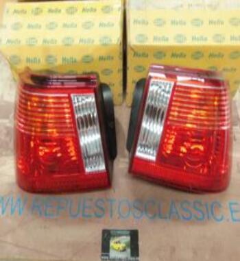 9EL964023014-9EL964024014 PH1N2 JUEGO PILOTOS TRASEROS SEAT IBIZA 99->02 HELLA SIN PORTALAMPARAS