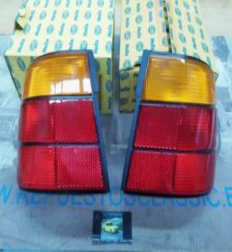 2VA005553111-2VA005553121 PH2N2 JUEGO PILOTOS TRASEROS BMW 5 E34 HELLA CON PORTALAMPARAS (27636-27637)