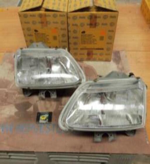 1AG006560251-1AG006560261 PH4N2 JUEGO FAROS DELANTEROS H1+H1 RENAULT LAGUNA 94>98, HELLA (12579-12580) REGULACION MANUAL