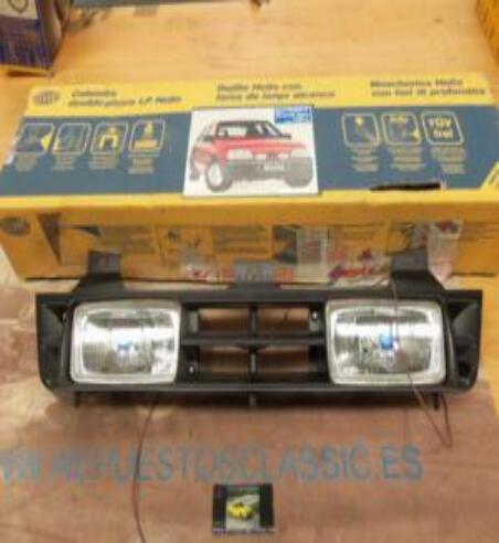 1FB006569811 PH4N2 REJILLA CON FAROS DE LARGO ALCANCE OPEL KADETT HELLA