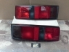 IFO52 JUEGO PILOTOS TRASEROS AHUMADOS FORD ESCORT MK4 86->90