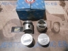 57 JUEGO PISTONES ALTA COMPRESION CON SEGMENTOS RENAULT 4, 5, 6, 7, 8 65 mm  MOTOR 956 cc. CON DOBLE DEFLECTOR ANTIGUO STOCK