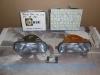 ISE09 P1/10 JUEGO OPTICAS FAROS CIBIE SEAT 131 1ª SERIE FOCO EUROPEO E9